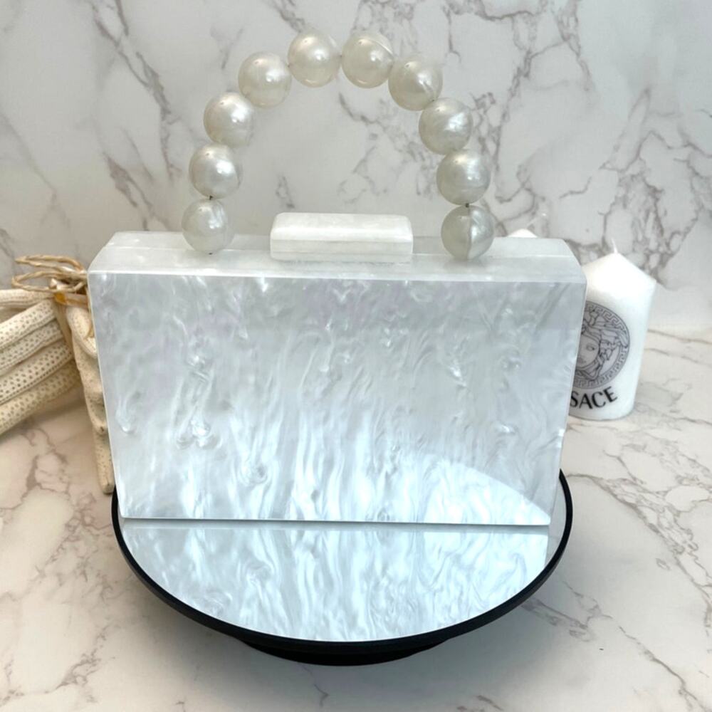 White Marbled Acrylic Box Clutch with Graduated Faux-Pearl Top Handle.